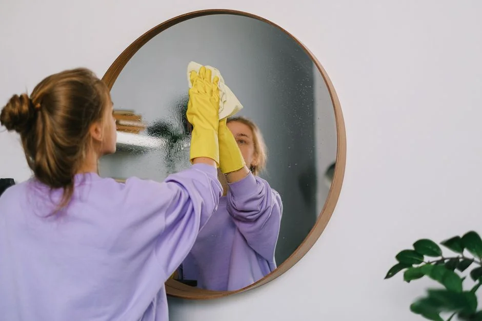 Colleagues interact in a modern office setting, blending technology with workplace hygiene.